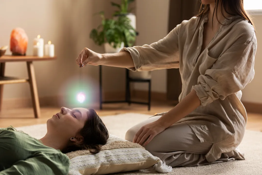 A person lying comfortably during a calm, restorative therapeutic session